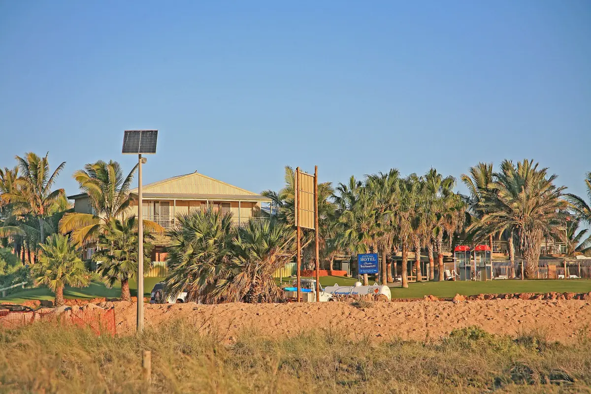 Palms and buildings in the small town of Coral Bay